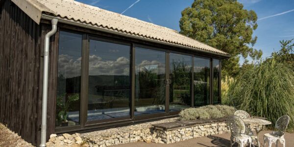 Photo of bespoke wood-clad hydrotherapy pool house