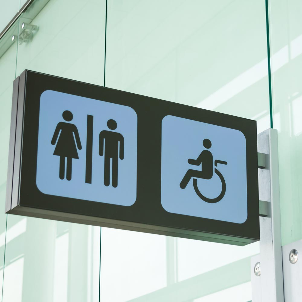 Photo of wheelchair accessible toilet sign