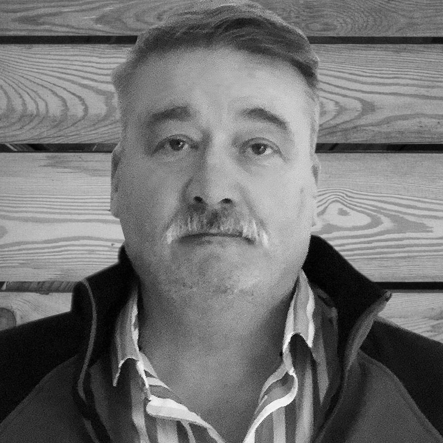 Russ Fowler - Site Manager Black and white portrait photo of Russ Fowler, Site Manager for Freedom Living Solutions in Kent.